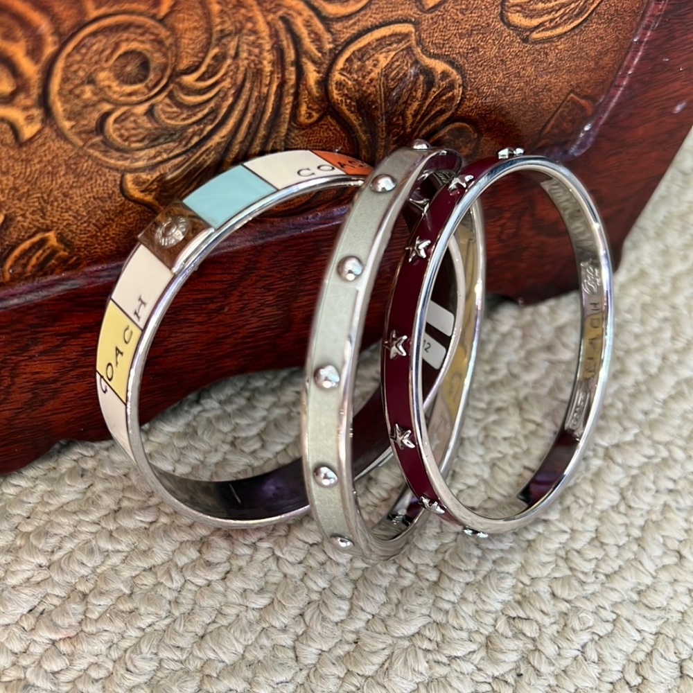 Set of 3 Silver Toned Coach bangle bracelets
